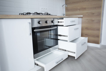 Interior of light modern kitchen with stove
