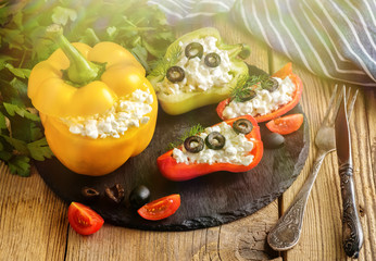 Bulgarian pepper stuffed with cheese with greens and olives.