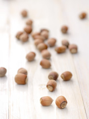 Hazelnut close up on wooden background.