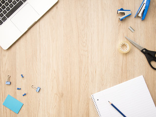 Office supplies with copy space in the middle. Top view