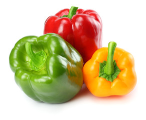 Obraz na płótnie Canvas three green, red, yellow sweet bell peppers isolated on white background