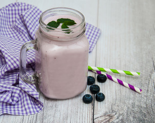 Glass with blueberry yogurt