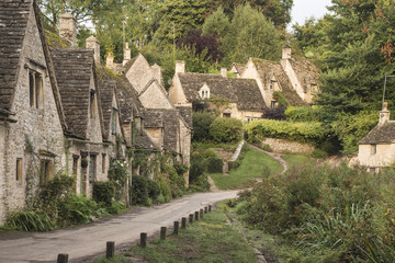 Fototapeta na wymiar Medieval houses in Arlington Row in Cotswolds countryside landscape in England