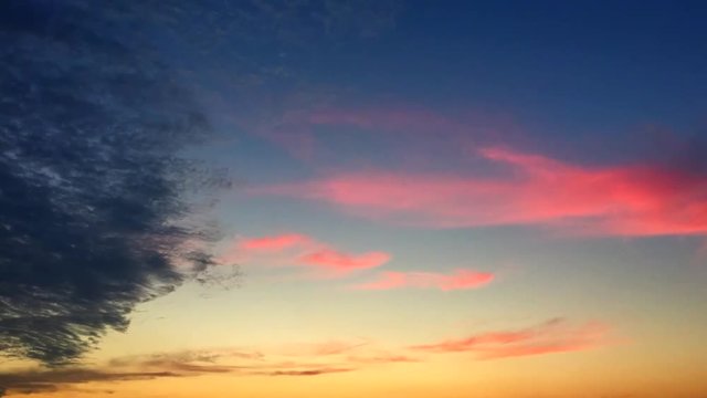 Twillight: The harmonization of the color: Grey cloud, Pink cloud, Blue sky, Yellow sunset.