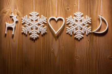 Christmas decorations against wooden background.