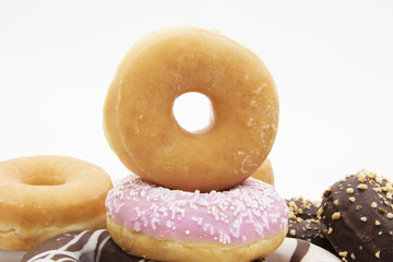 fresh donuts isolated and stacked