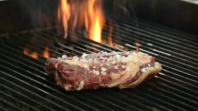 Grilling meat steak