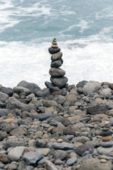 stack of zen stones on the beach