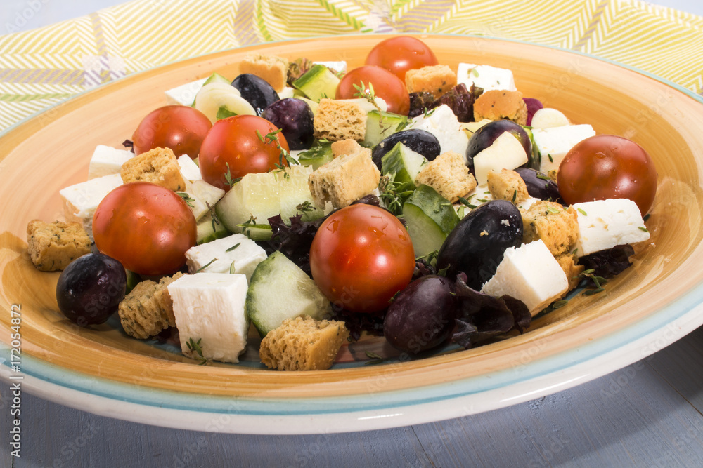 Wall mural mediterranean salat on a plate