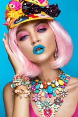 Funny comic girl with bright make-up in the style of pop art. Creative image. Beauty face. Photo...