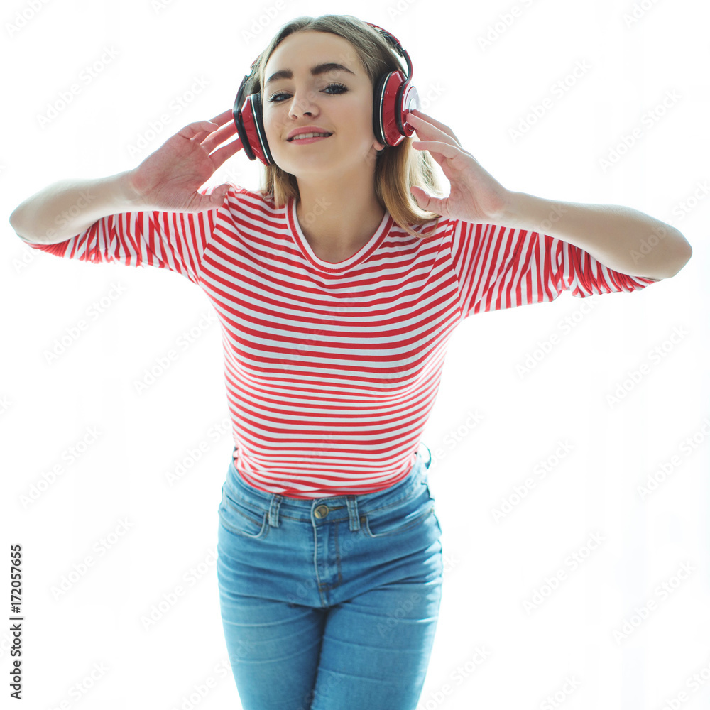 Wall mural girl listening to music