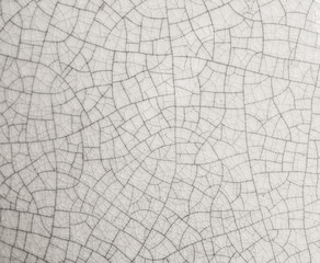 Cracked white Ceramic of tile Close up background and texture
