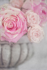 Lovely bunch of flowers .Close-up floral composition with a pink roses .Beautiful fresh pink roses on a table. 