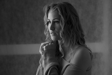 Beautiful retro portrait of a woman in living room