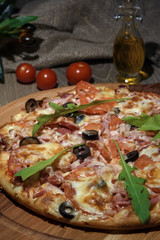 Delicious fresh pizza served on wooden table
