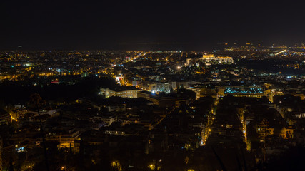 Fototapeta na wymiar The skyline of Athens with the Parthenon and the Acropolis at night