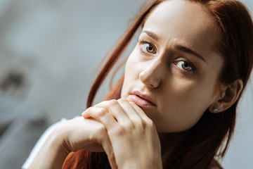 Sad attractive woman feeling upset