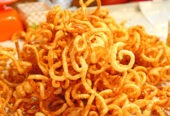 Deep fried pork skin snacks , Thai style food.