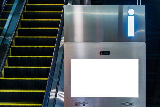White mokeup billboard and escalator 