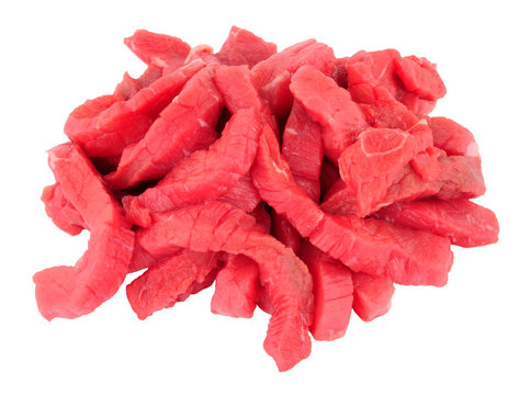 Fresh raw stir fry beef strips isolated on a white background