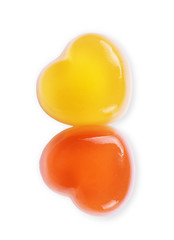 Colorful jelly candy hearts isolated on white