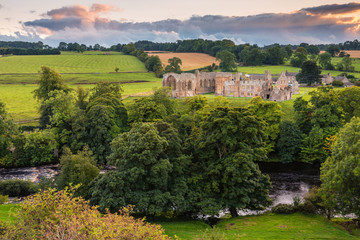 River Tees flows past Egglestone Abbey / The remains of Egglestone Abbey on the banks of River Tees, near Barnard Castle in County Durham