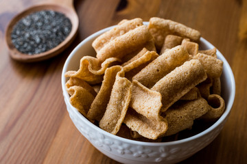 Fototapeta na wymiar Chia Chips or Crackers in a bowl.