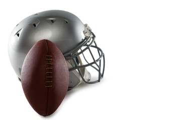 Close-up of helmet and American football