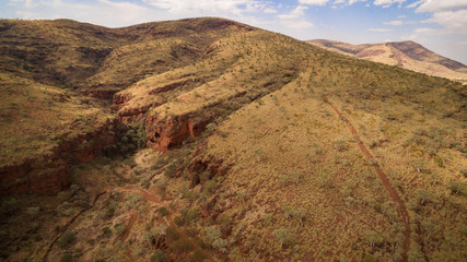 Aerial view at Dawn of Mountainous Landscape in the Karijini National Park, Pilbara Australia