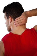 Fototapeta premium Rear view of sports player suffering from neck pain