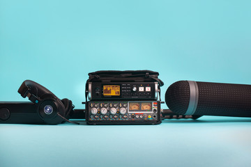 equipment for field audio recording on blue background - 172109664