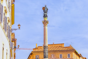 Fototapeta na wymiar Column of the Immaculate Conception (Colonna dell'Immacolata) near Spanish Steps (Scalinata di Trinita dei Monti), (Piazza della Trinita dei Monti).