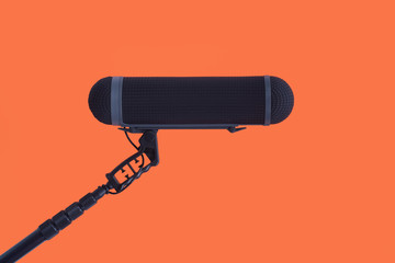  Sound recorder microphone, boom mic on red background - 172110263