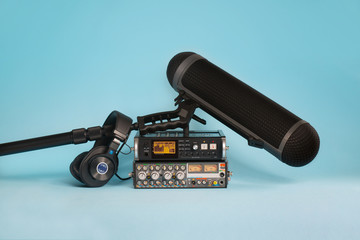 equipment for field audio recording on blue background