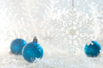 Christmas balls. New Year's photo with a snowflake and Christmas balls.