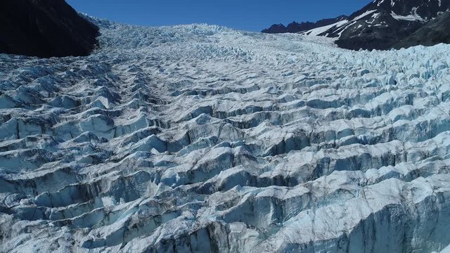 Arial 4k shots of a glacier and it's surroundings in Alaska