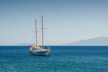 Sunny view of boats at Ortakent near Bodrum, Mugla, Turkey.