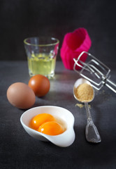  Egg beater, eggs and  silicone baking dish