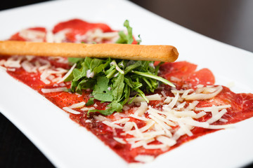 Meat carpaccio with Parmesan