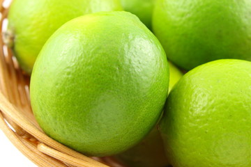 fresh lime fruits in a basket
