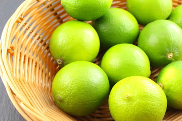 fresh lime fruits in a basket