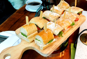 roast beef dip sandwich au jus and fries, top view