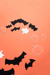 Frame of haloween symbols on red background for logo and text