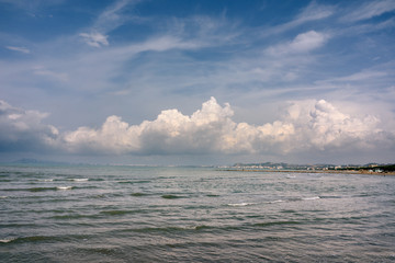 Fototapeta premium Albania. Golem. Seascape of the Adriatic Sea with cumulus clouds.