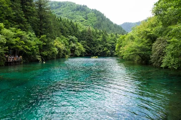 Fleecedeken met foto Peacock lake, one of the largest lake in Jiuzhaigou national park. Shape of lake, when view from above, will look like a peacock. © yanisapae