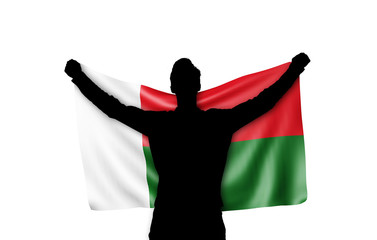 Male silhouette holding Madagascar national flag. 3D Rendering