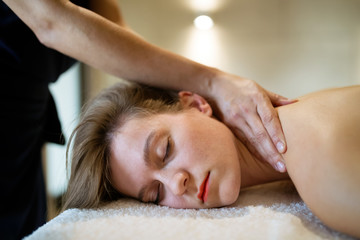 Obraz na płótnie Canvas Professional masseur working on client