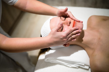 Rejuvenating relaxing massage by masseur
