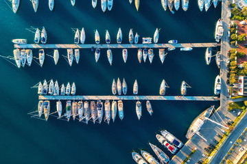 Aerial view of amazing boats at sunset in Marmaris, Turkey. Minimalistic landscape with boats and...