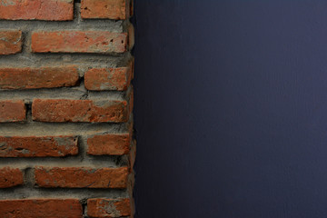 Old orange stone brick texture and navy blue texture of cement wall and not smooth for background...